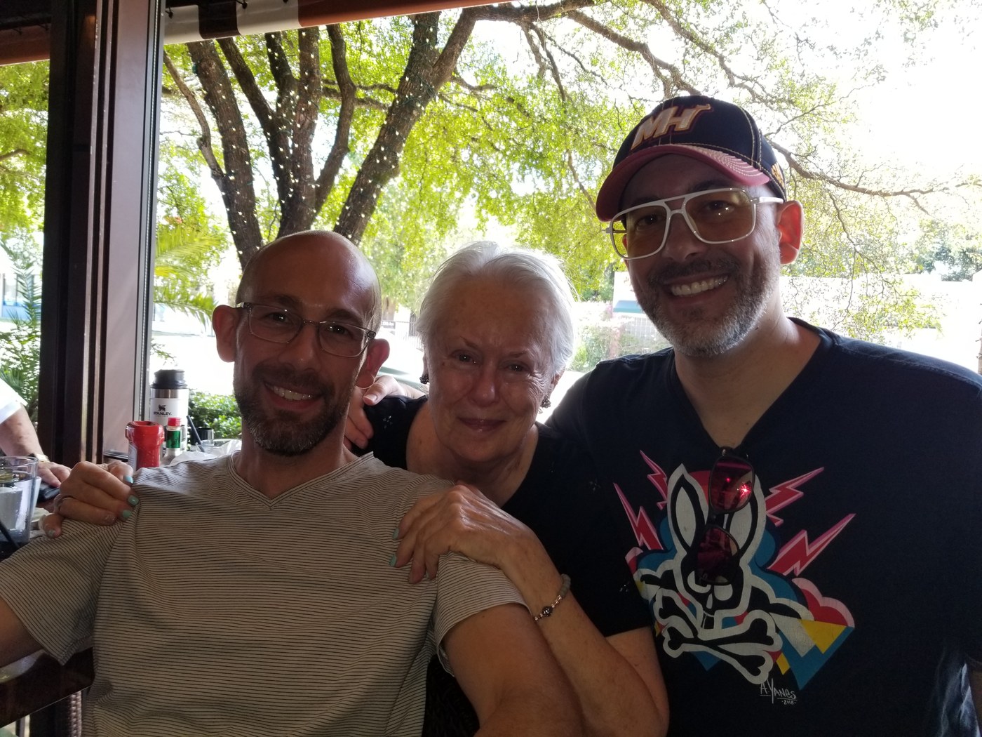 Susan Miles Rodriguez with family outdoors